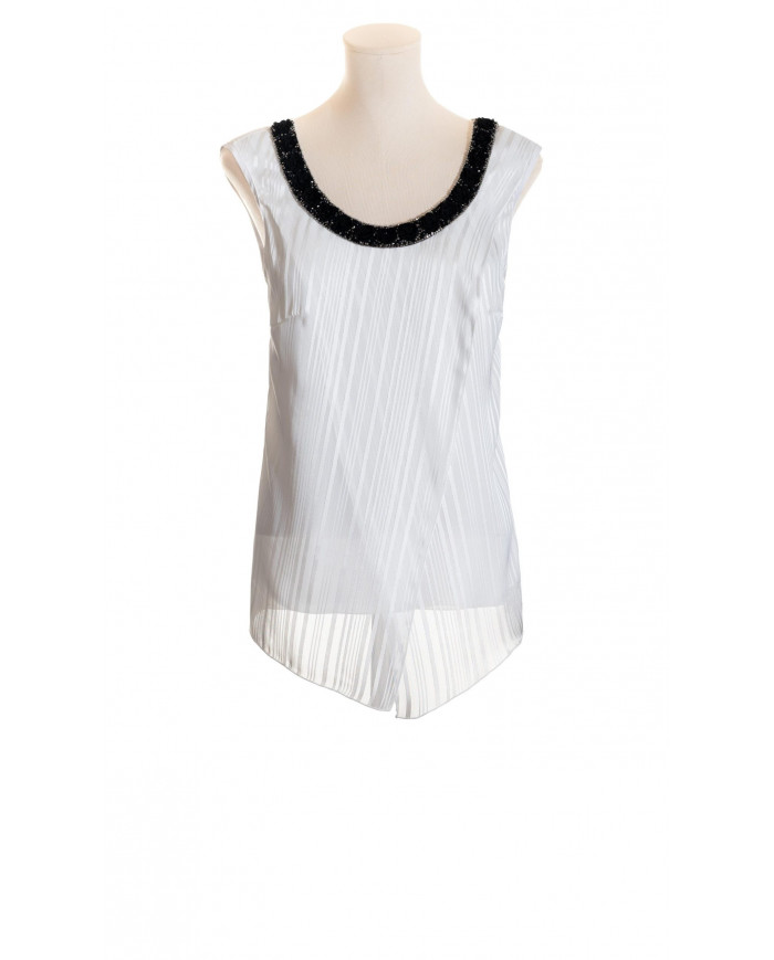 Cuerpo vaporoso con escote redondo