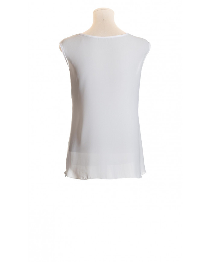 Cuerpo vaporoso con escote redondo