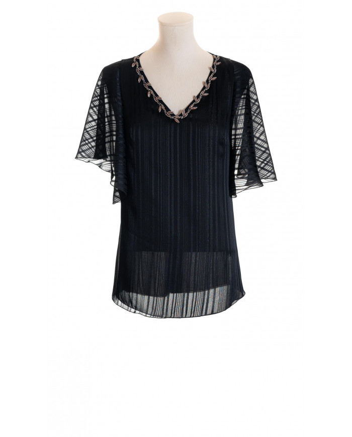 Cuerpo vaporoso con escote de pico